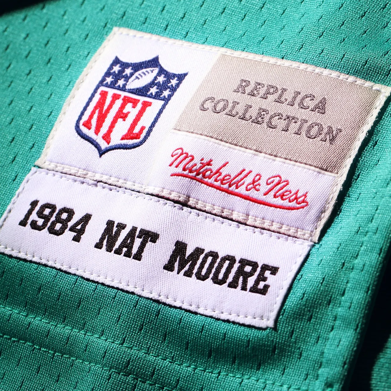 Nat Moore Miami Dolphins Mitchell & Ness 1984 Retired Player Legacy Replica Jersey - Aqua - Image 7
